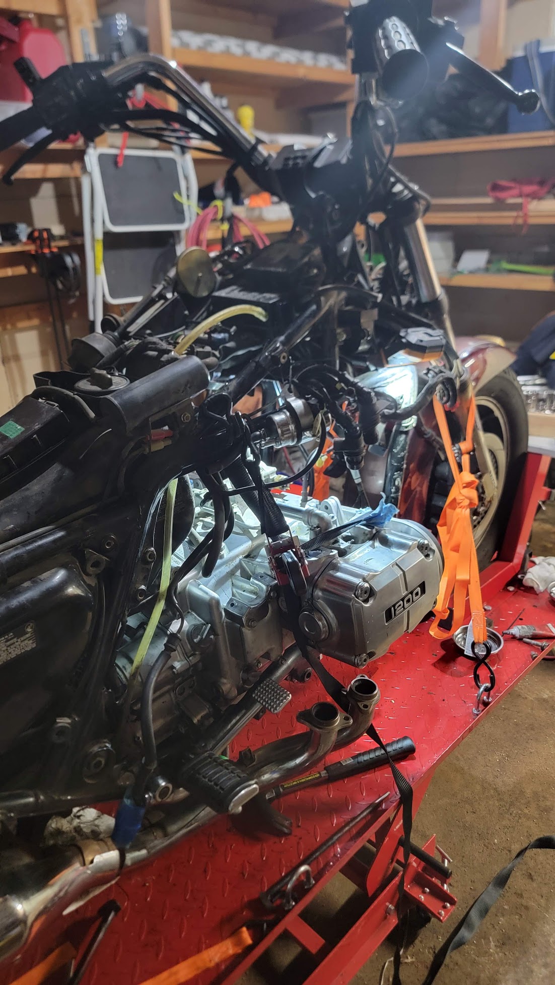 Goldwing before restoration on lift